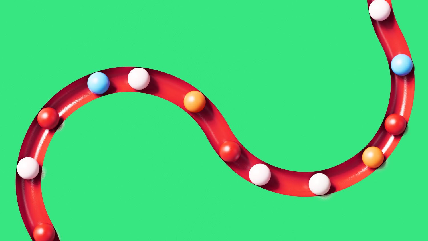 Colorful spheres rolling throw a snaking track