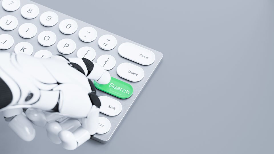 Mechanical hand pressing a search button on a keyboard